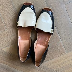 Rachel Comey slides with brass detailing.